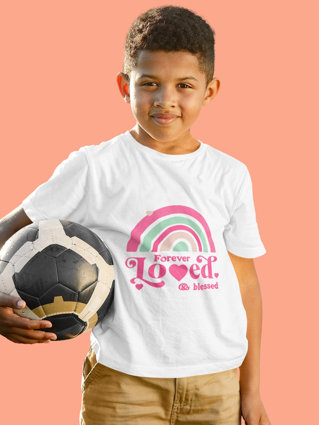 CIASARA cute rainbow toddler t-shirt worn by boy holding soccer ball with Forever Loved print
