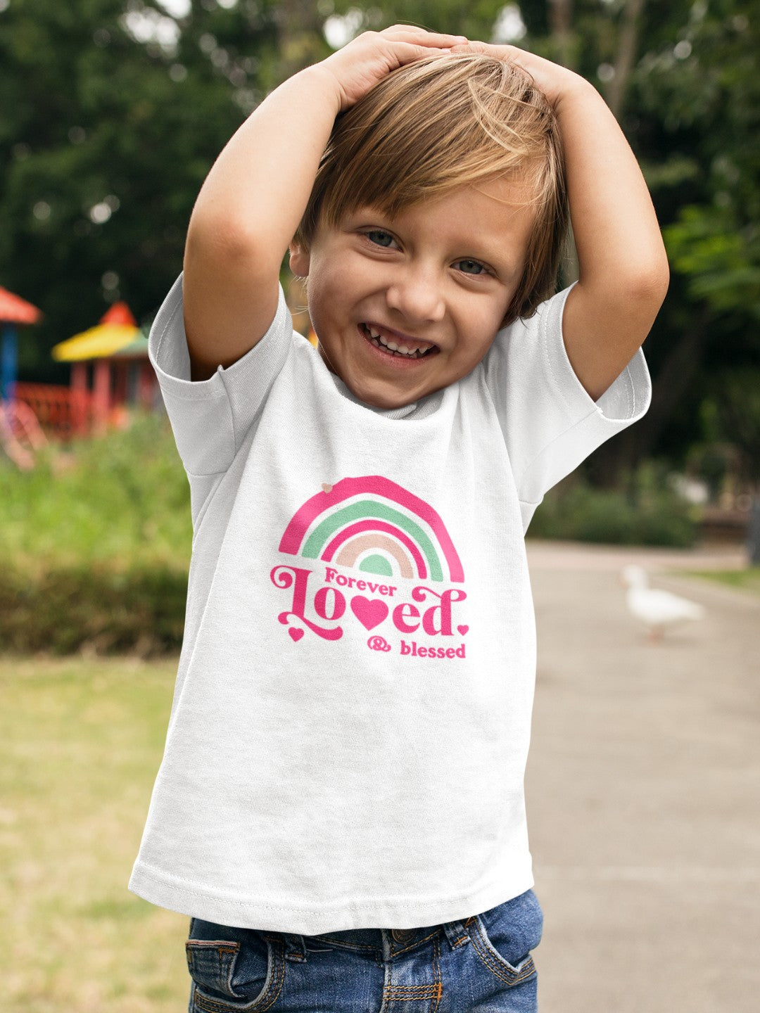 CIASARA cute rainbow toddler t-shirt with pink and green design worn by smiling child outdoors