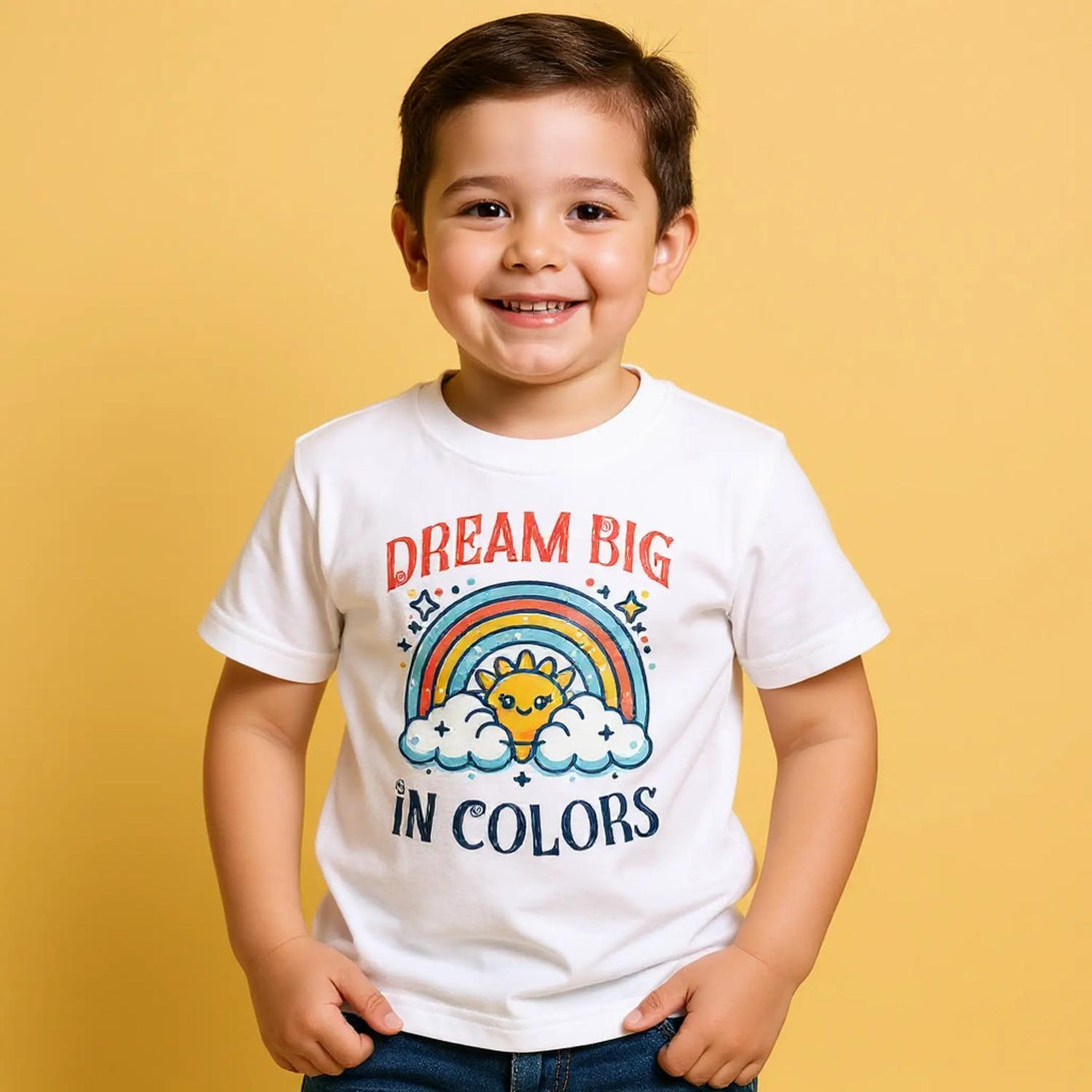 CIASARA boys colorful toddler t shirt with Dream Big rainbow design worn by smiling child