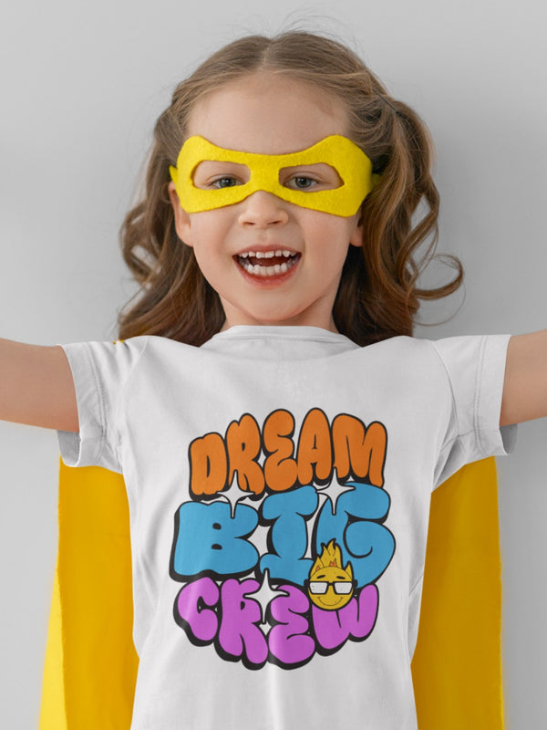 CIASARA motivational toddler t-shirt with Dream Big Crew graphic worn by smiling child in yellow superhero mask and cape