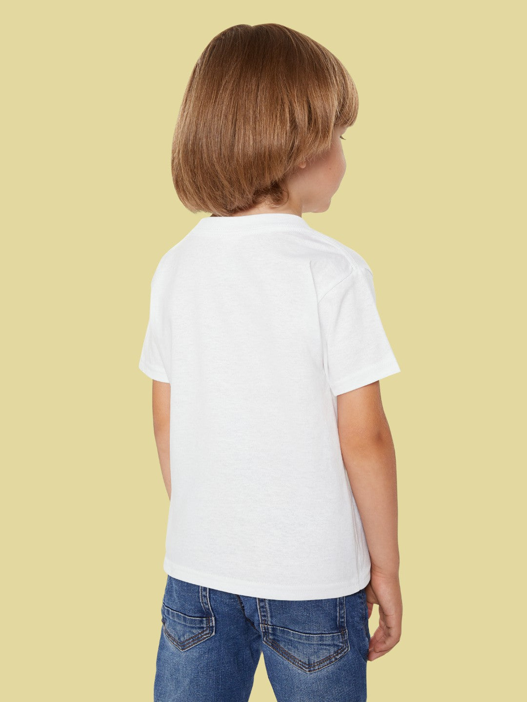 Back view of a toddler wearing a white motivational toddler t-shirt and blue jeans by CIASARA
